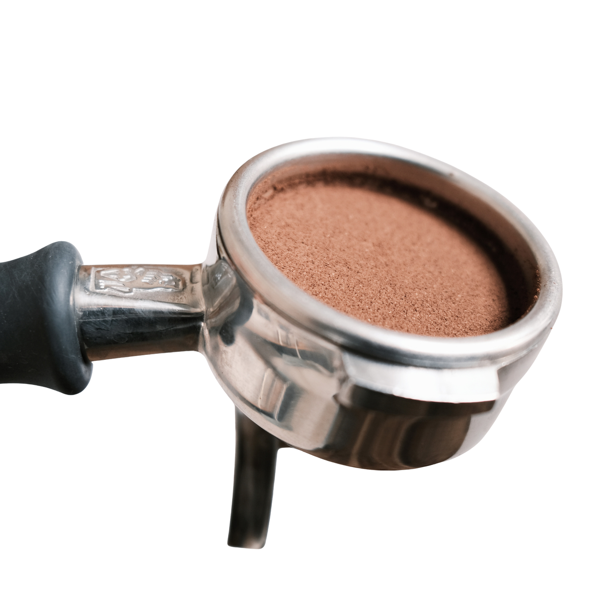 Nahaufnahme eines Espresso-Levelers für gleichmäßige Kaffeeverteilung im Siebträger, verbessert Extraktion ohne Channeling.