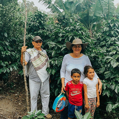 Maria Rosa Perez and her family on the their farm.